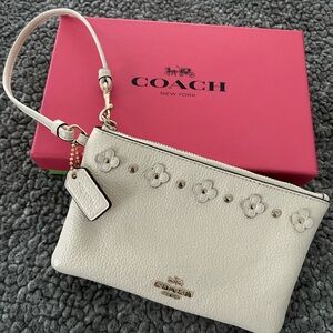 Coach Ivory Wristlet with Floral Embellishments
